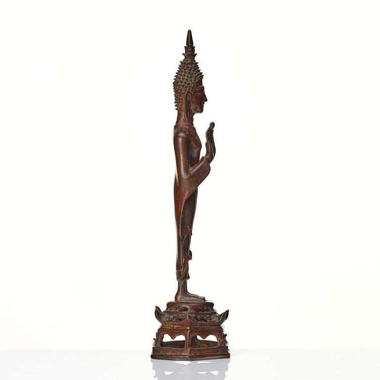 A standing sculpture of buddha, Laos, 18th Century.