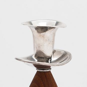 Two pairs of candlesticks, one designed by Saara Hopea, Kultakeskus, Hämeenlinna 1965.