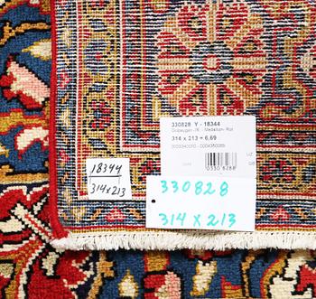 A Golpaygan carpet, c. 314 x 213 cm.