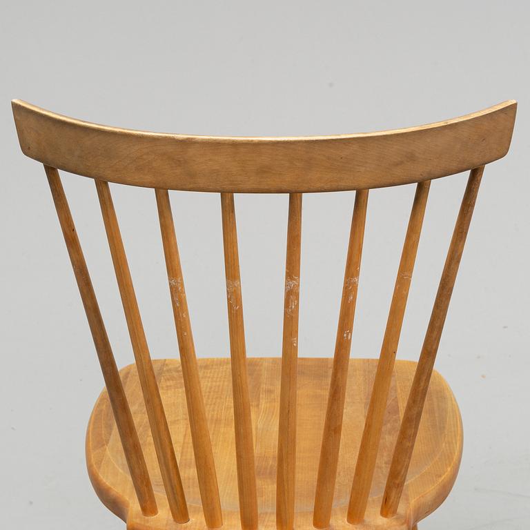 A set of eight 'Lilla Åland' birch chairs by Carl Malmsten for Stolab dated 1996.
