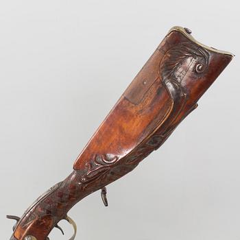 A percussion lock rifle from around 18/19th century,