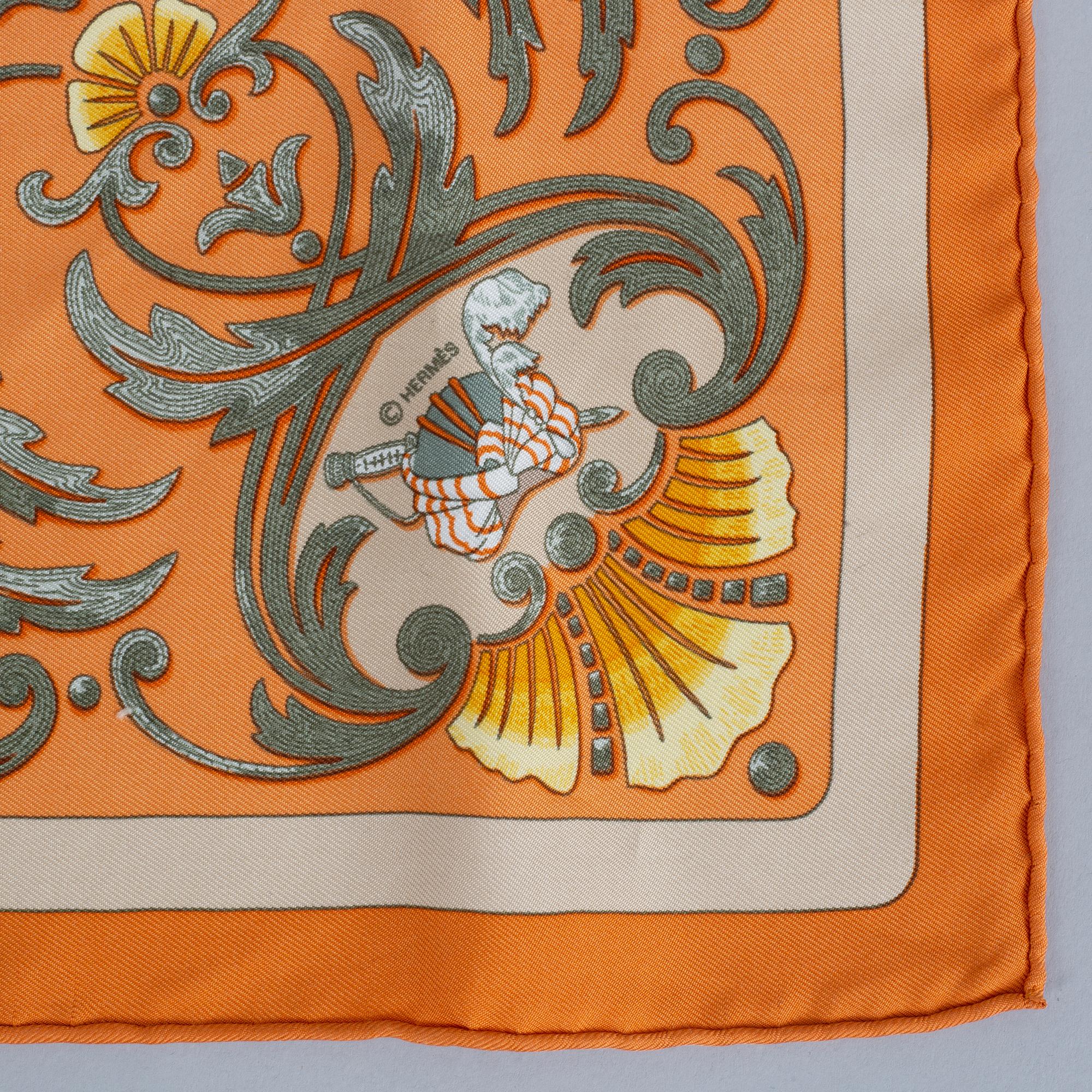 Hermès, scarf and leather cover.