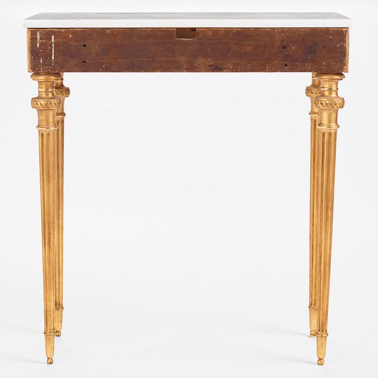 A late Gustavian carved giltwood and marble console table attributed to P. Ljung (1743-1819).