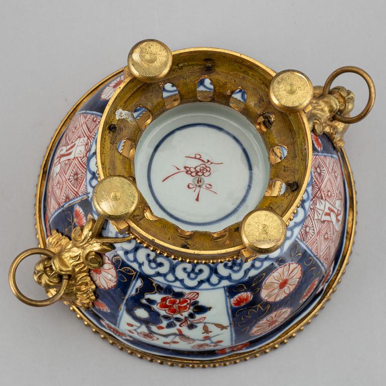 A Japanese imari bowl, with  European bronze mount, 19th century.