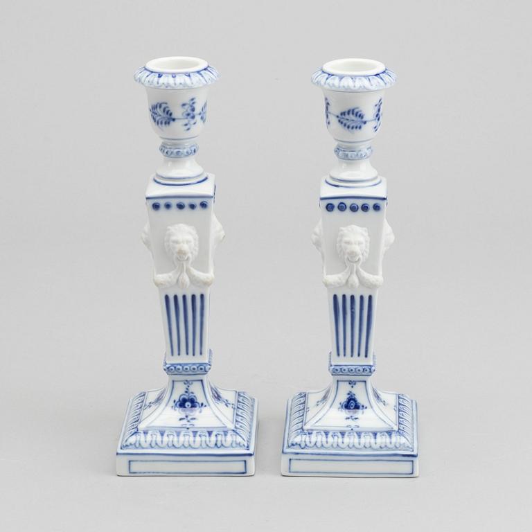 A PAIR OF ROYAL COPENHAGEN PORCELAIN CANDLE STICKS.
