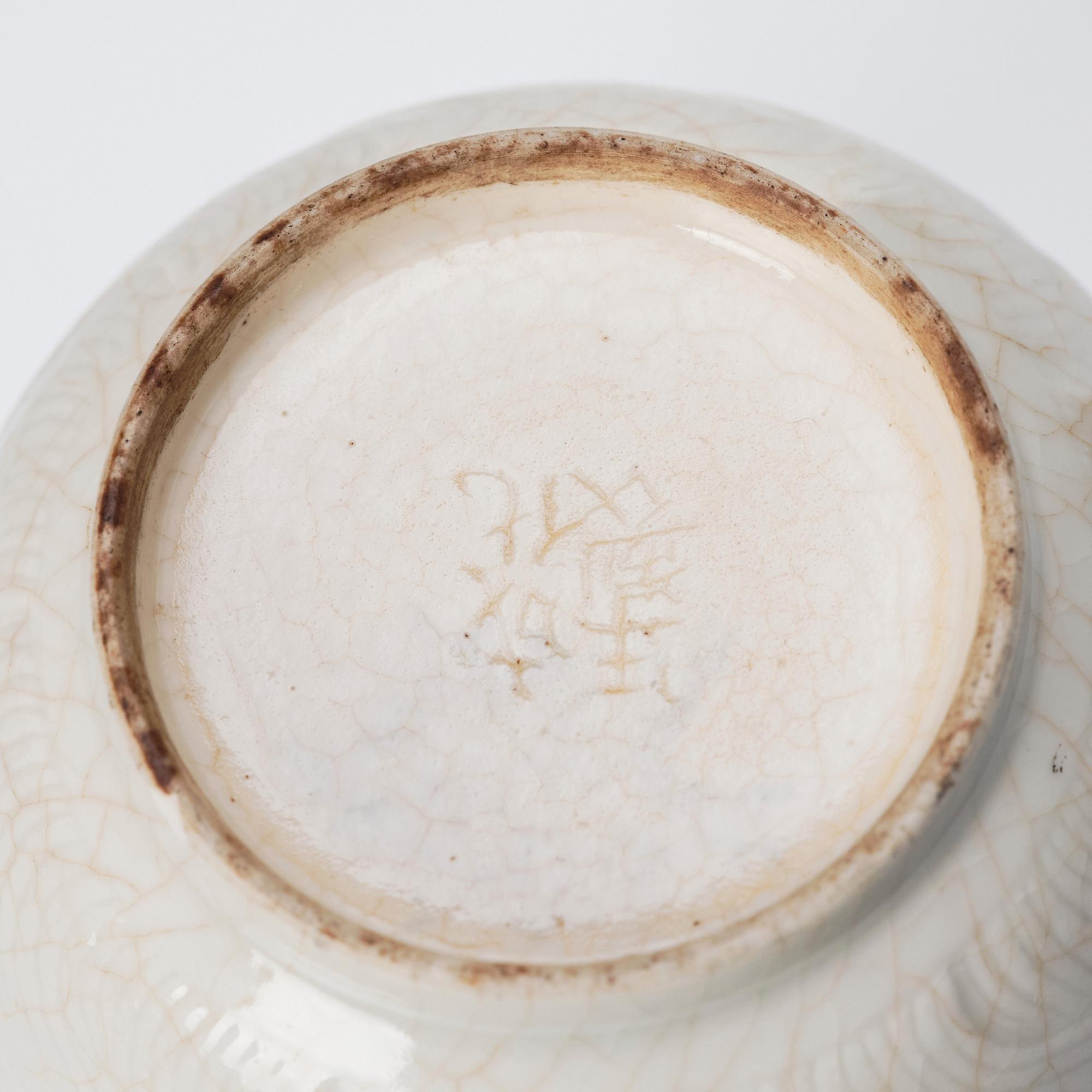 Kopp samt skålfat, blanc de chine. Kina, Qingdynastin, Kangxi (1662-1722).