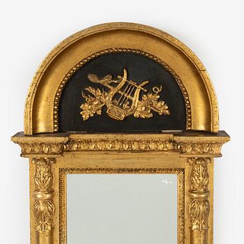 An Empire mirror, first half of the 20th Century.