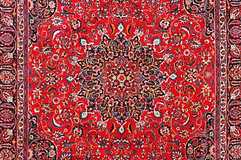 A Najafabad carpet, c. 351 X 305 cm.