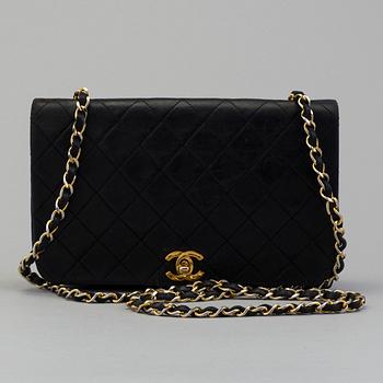 Chanel "Medium Classic Full Flap".