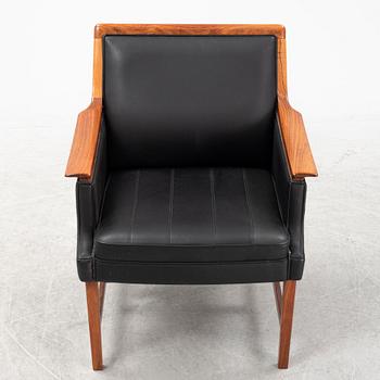 Torbjørn Afdal, a 'Minerva' rosewood desk and a chair, Bruksbo, Haug Snekkeri AS, Norway, 1960's.