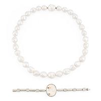 A Gaudy necklace with cultured South Sea pearls, a platinum bracelet, and two clasps.