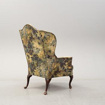 A Queen Anne-style armchair, 19th century.