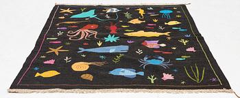 A hand-embroidered Kilim rug, c. 200 x 155 cm.