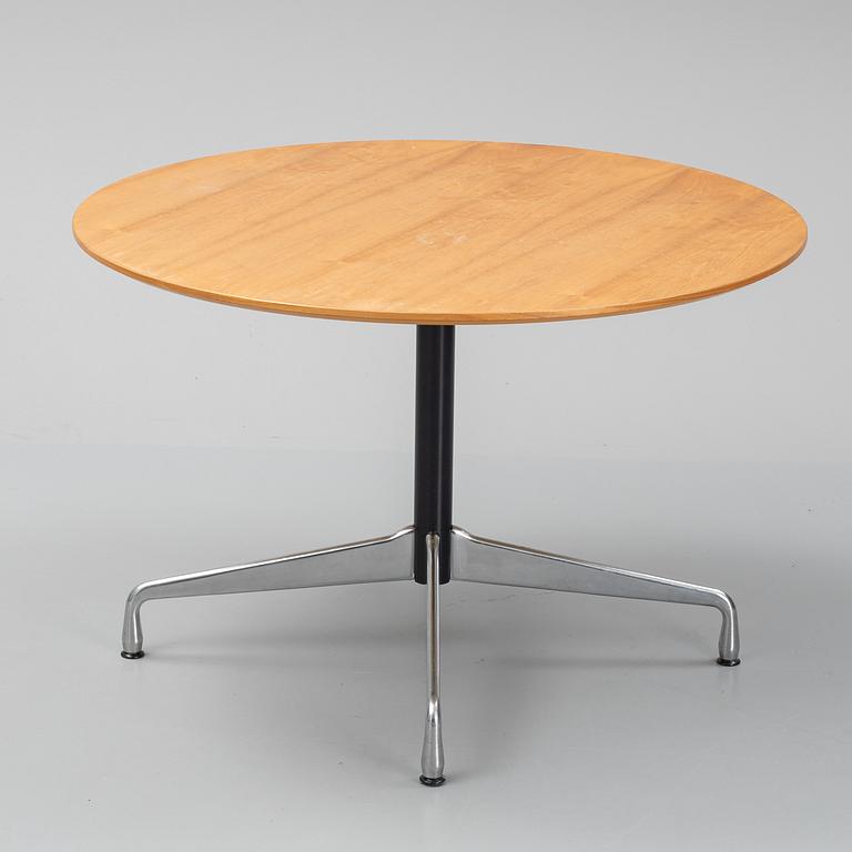 Charles & Ray Eames, a"Segmented Round Dining Table" from Vitra.