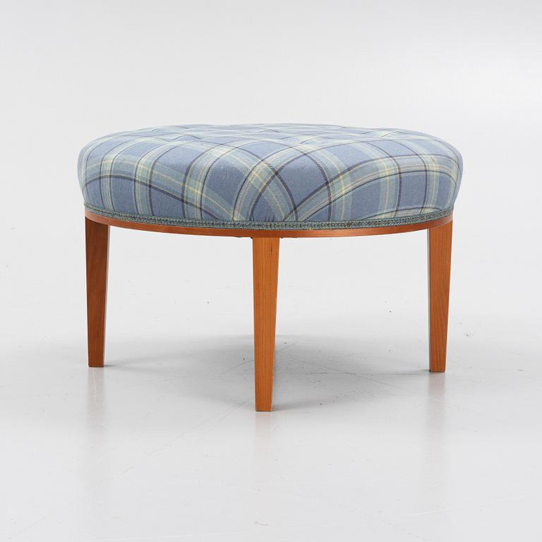 Josef Frank, a model 647 cherry wood stool by Firma Svenskt Tenn.