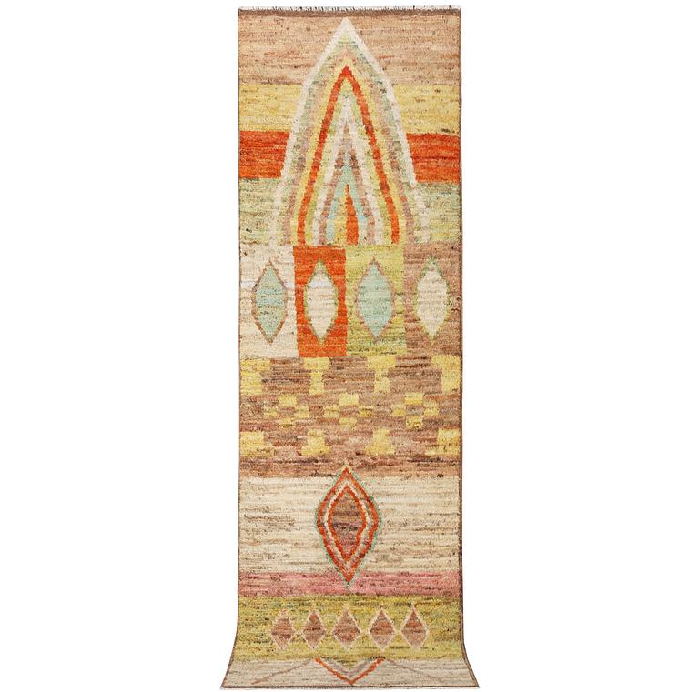 A Moroccan runner carpet, c. 304 x 84 cm.