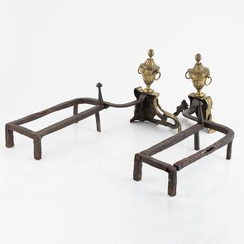 A pair of bronze andirons, Louis XVI-style, around 1800.