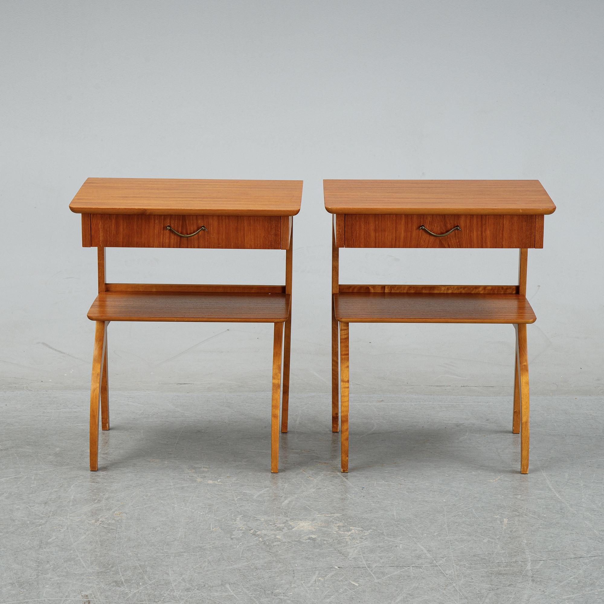A pair of teak and birch bedside tables, mid 20th Century.