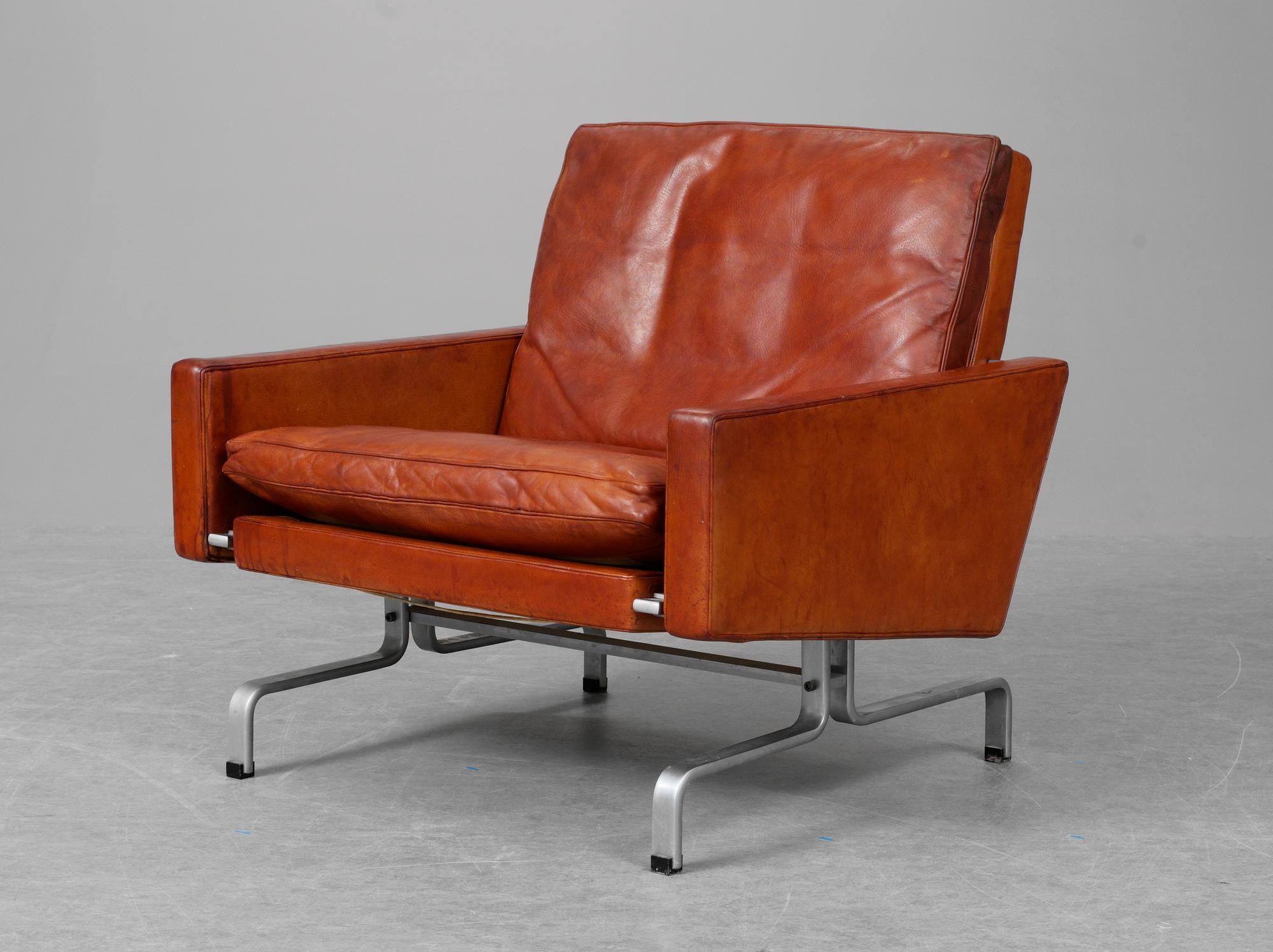 A Poul Kjaerholm brown leather and steel armchair "PK-31", E Kold Christensen, Denmark, 1960's, maker's mark in the steel.