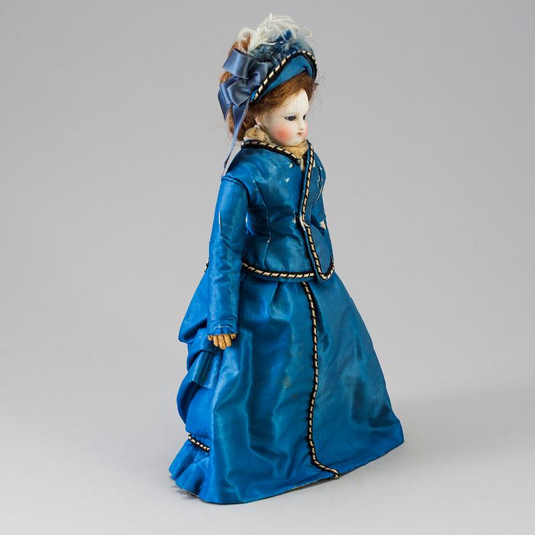 A bisque head fashion doll, probably France, late 19th century.