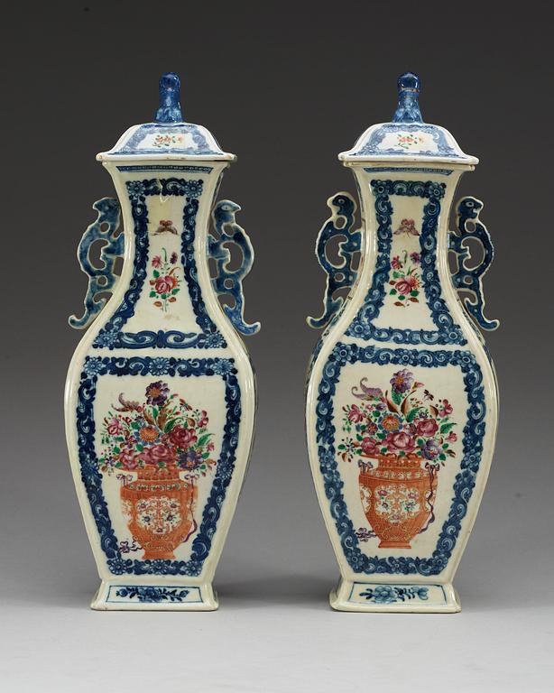 A pair of famille rose vases with covers, Qing dynasty, Qianlong (1736-95).