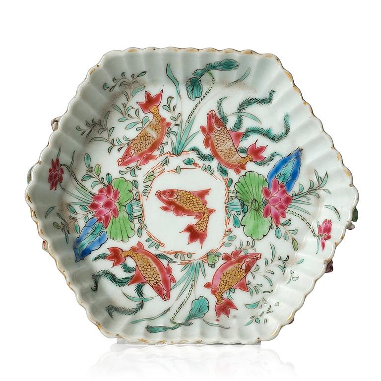 A hexagonal famille rose tea pot stand, Qing dynasty, Yongzheng (1723-35).