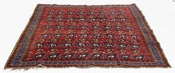 An oriental rug, semi antique, probably Baluch, c. 210 x 170 cm.