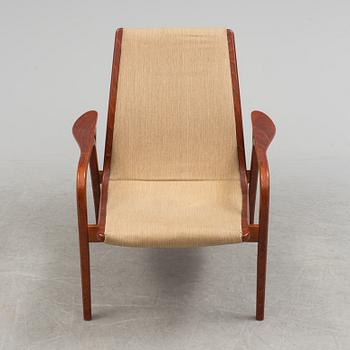 YNGVE EKSTRÖM, a "Kurva" armchair by Swedese.