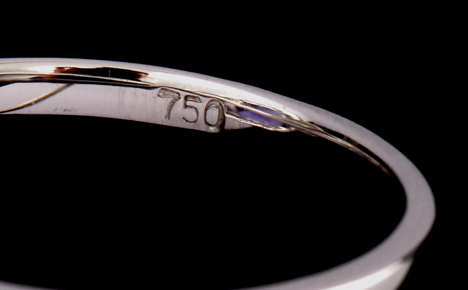 RING, 18k vitguld med fasettslipad tanzanit, 3.80 ct samt briljantslipade diamanter, 0.49 ct. Vikt 4,5 g.
