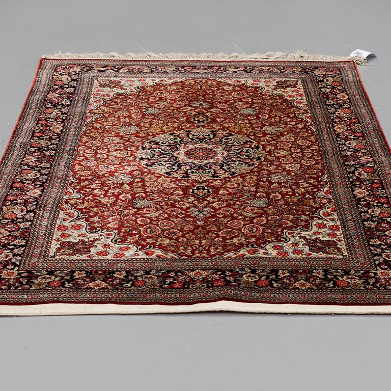 A SILK QUM RUG, around 154 x 101 cm.