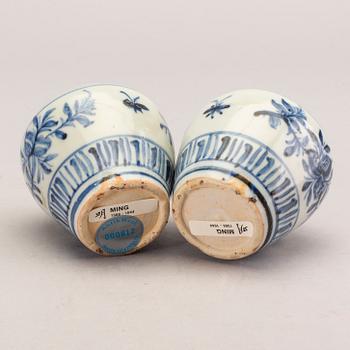 A pair of Chinese porcelain miniature jars, Ming dynasty (1368-1644).