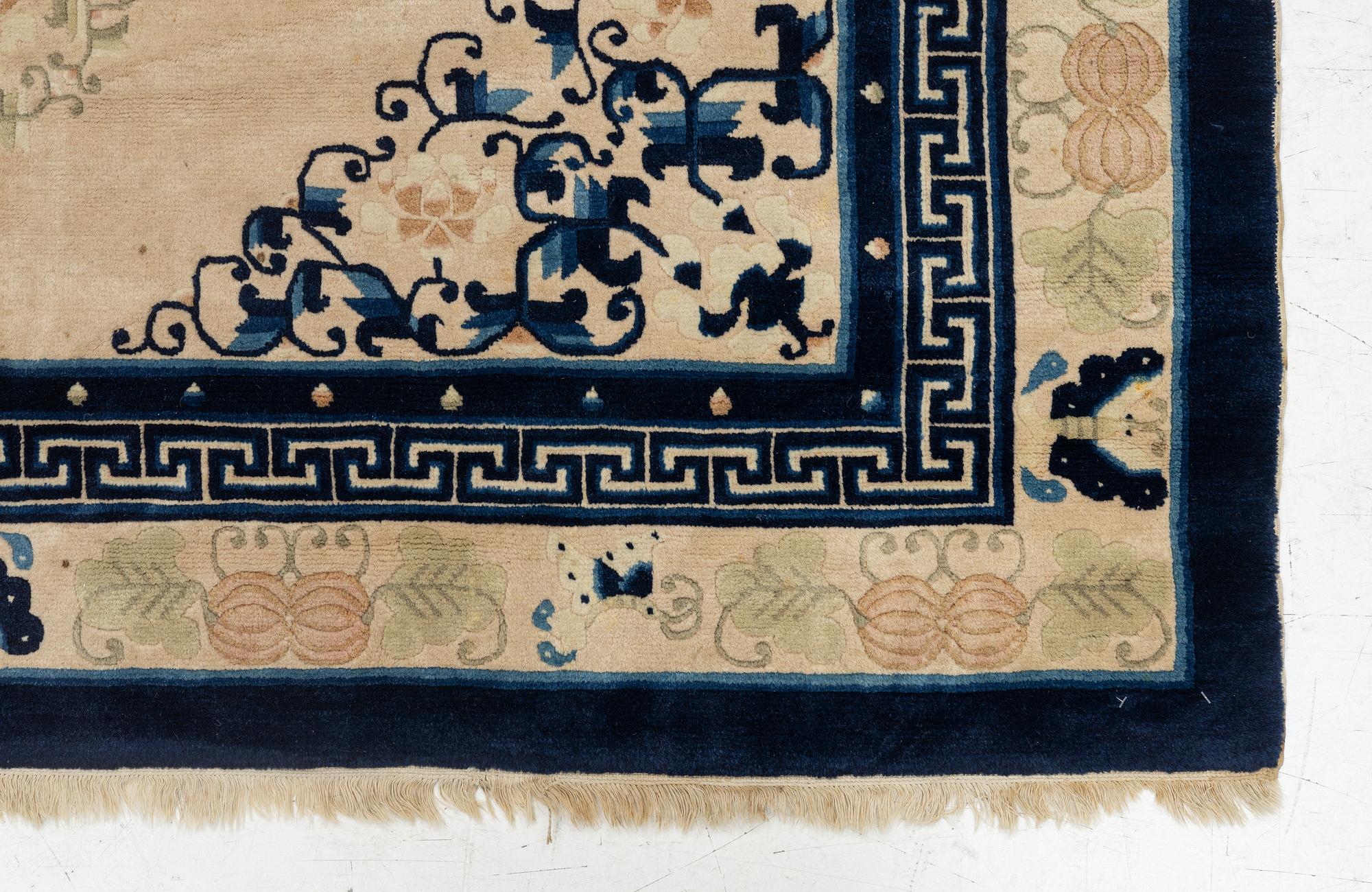 A carpet, old, China (antique finish), c. 276 x 189 cm.