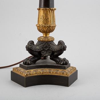 A first half of the 19th century bronze table lamp.