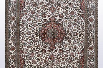 A carpet, silk Kashmir, ca 260 x 172 cm.