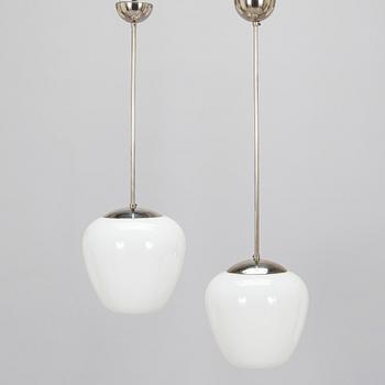 Gunnel Nyman, two 1940's pendant '81003' lights for Idman.