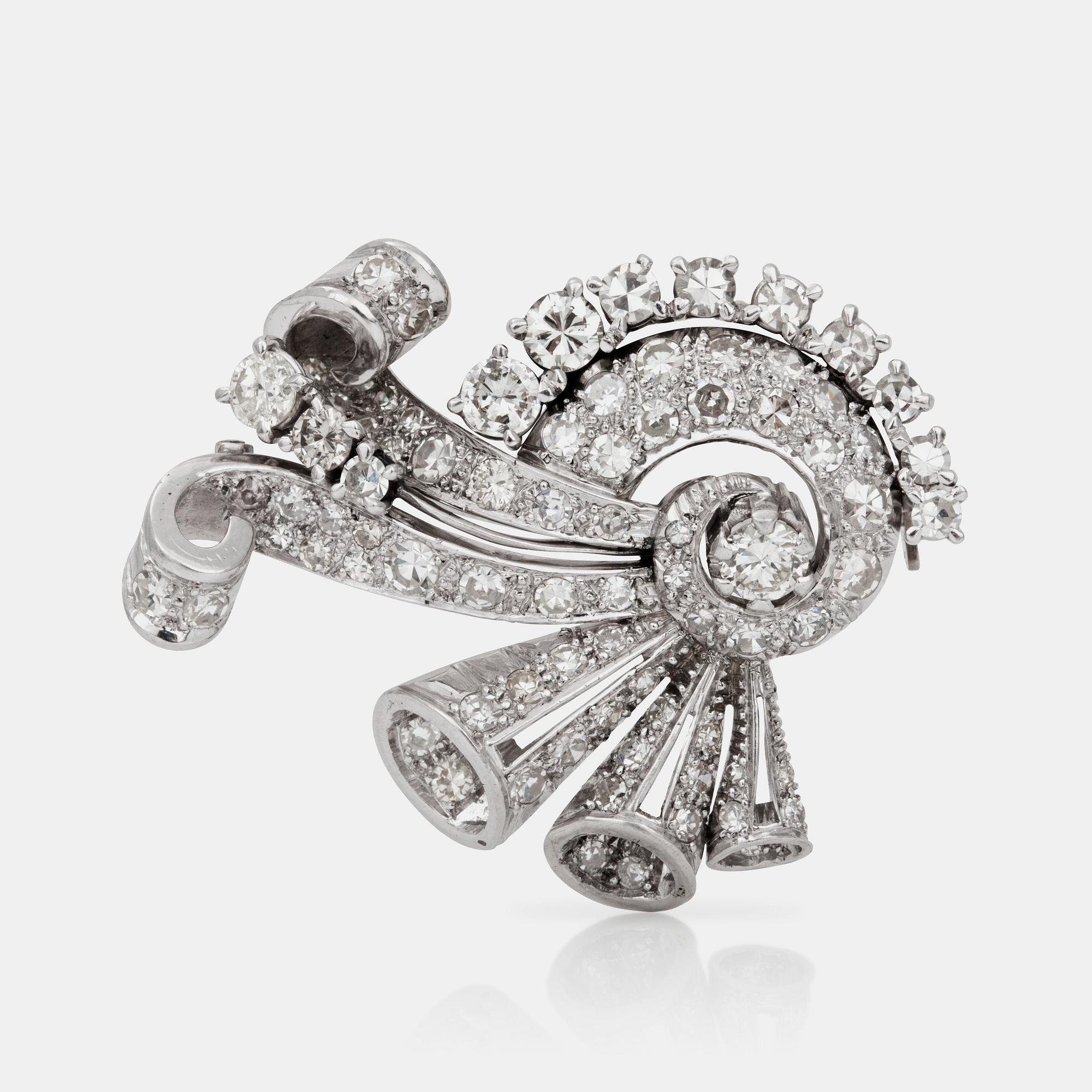 BROSCH med åttkants- samt briljantslipade diamanter totalt ca 3.20 ct.