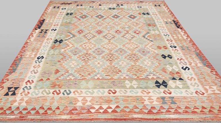 A Kilim rug, approx. 299 x 196 cm.