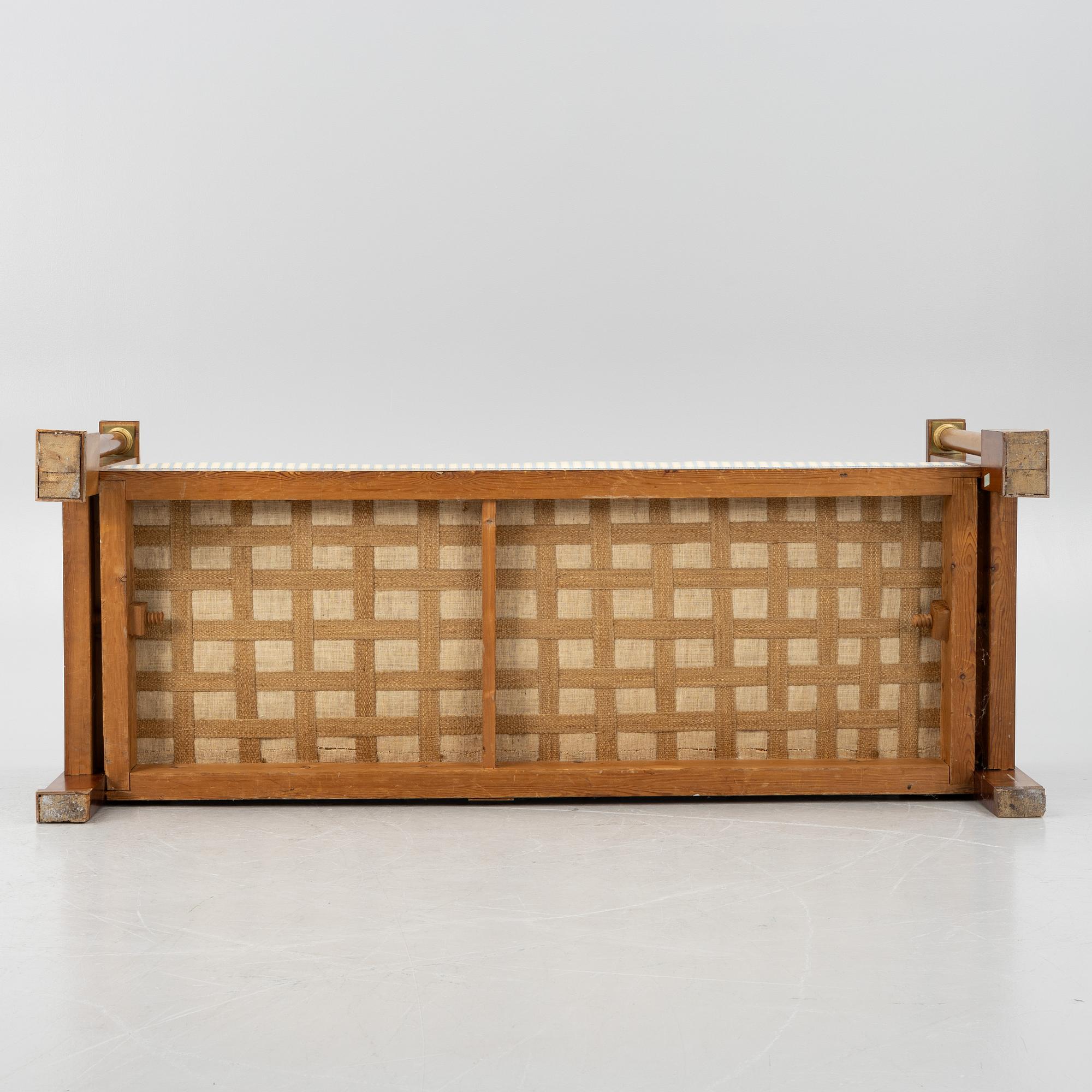 An Empire sofa, first half of the 19th century.