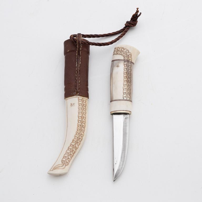 A reindeer horn knife by Bertil Fällman, signed.