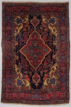 A CARPET, a semi-antique/old Bidjar, ca 210-213,5 x 140,5-144 cm.