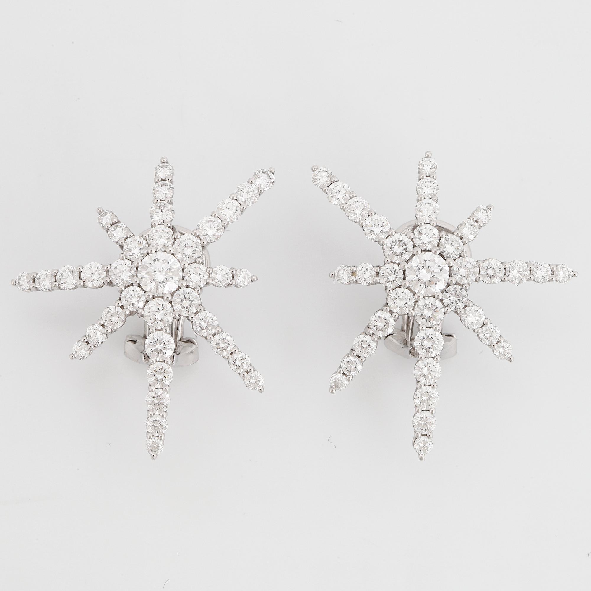 A pair of Chopard brilliant-cut diamond earrings.