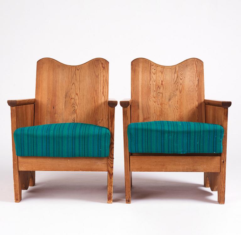 Axel Einar Hjorth, a pair of "Utö" stained pine armchairs, Nordiska Kompaniet 1930s.