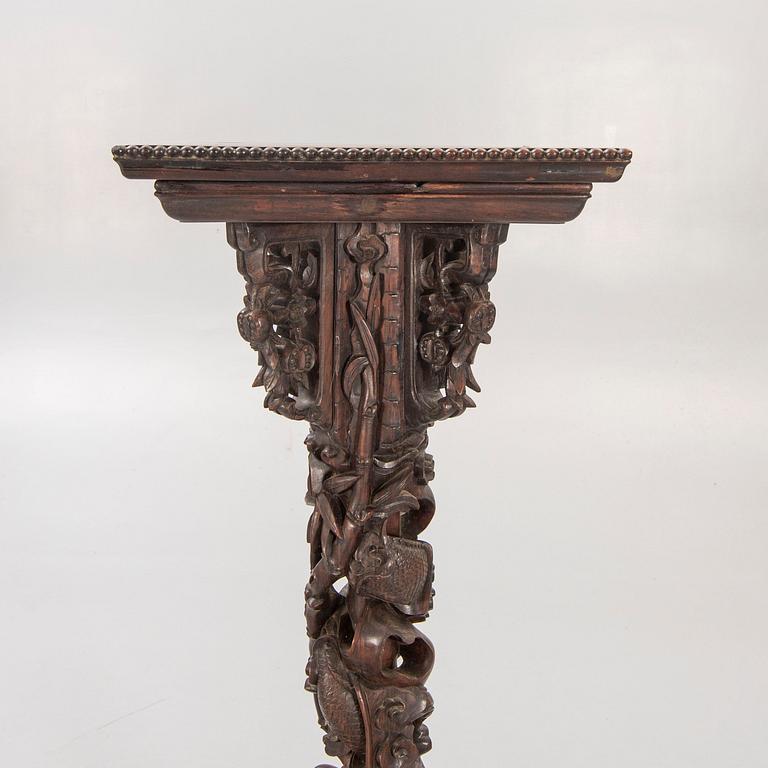 A Chinese wooden pedestal from Shanghai around 1900.