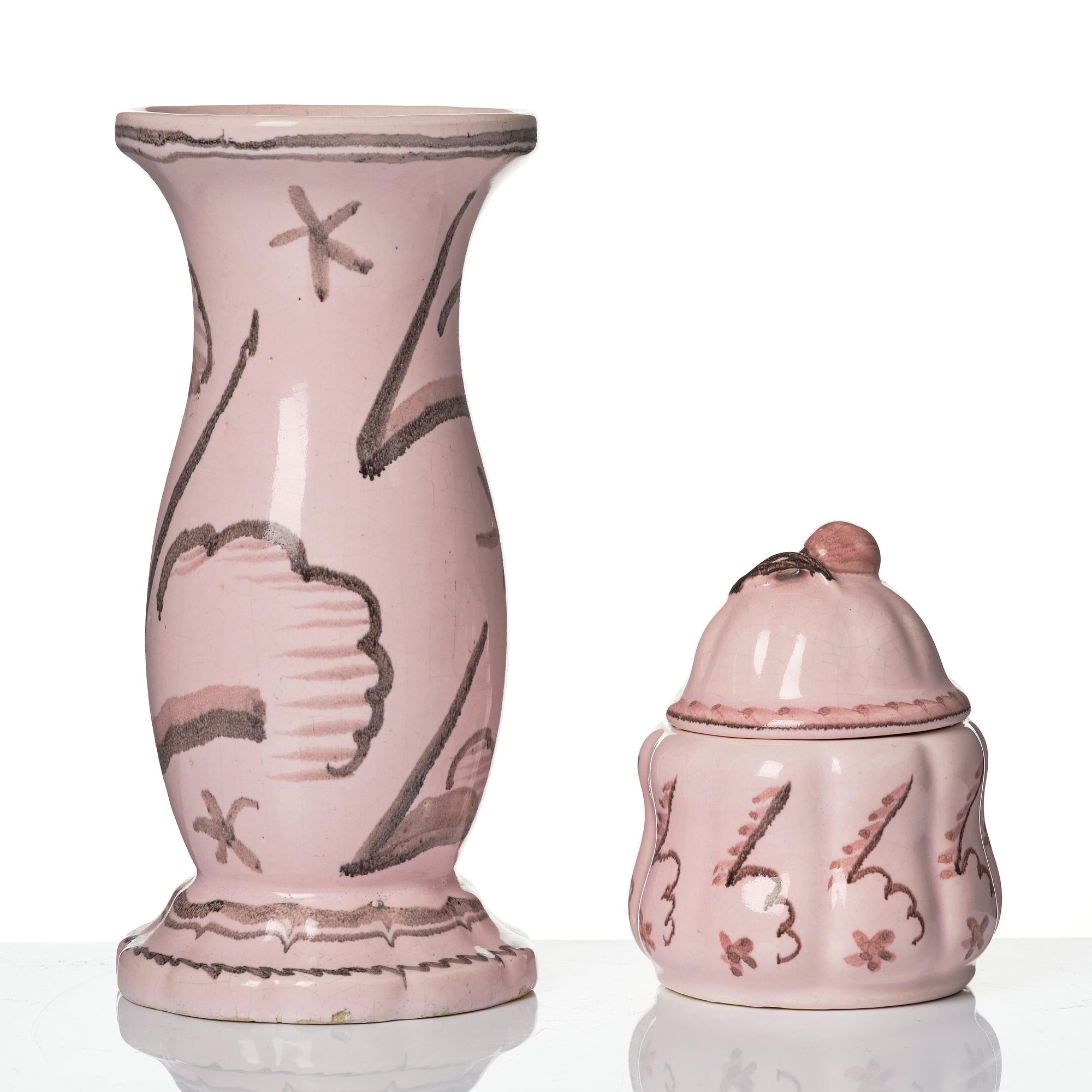 Wilhelm Kåge, Two earthenware vases, a lamp base and a jar with cover, Gustavsberg, Sweden, dated 1920.