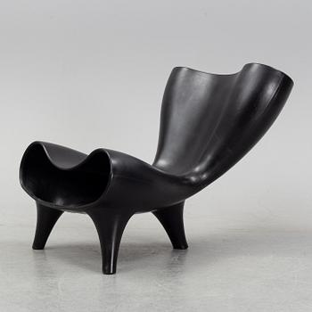 A Marc Newson, a 'Orgone' chair, designed 1993.