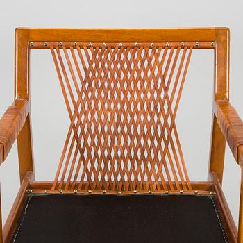 Carl Gustaf Hiort af Ornäs, a pair of late 1950s 'Rialto' open armchairs, Puunveisto Oy - Träsnideri Ab, Finland.