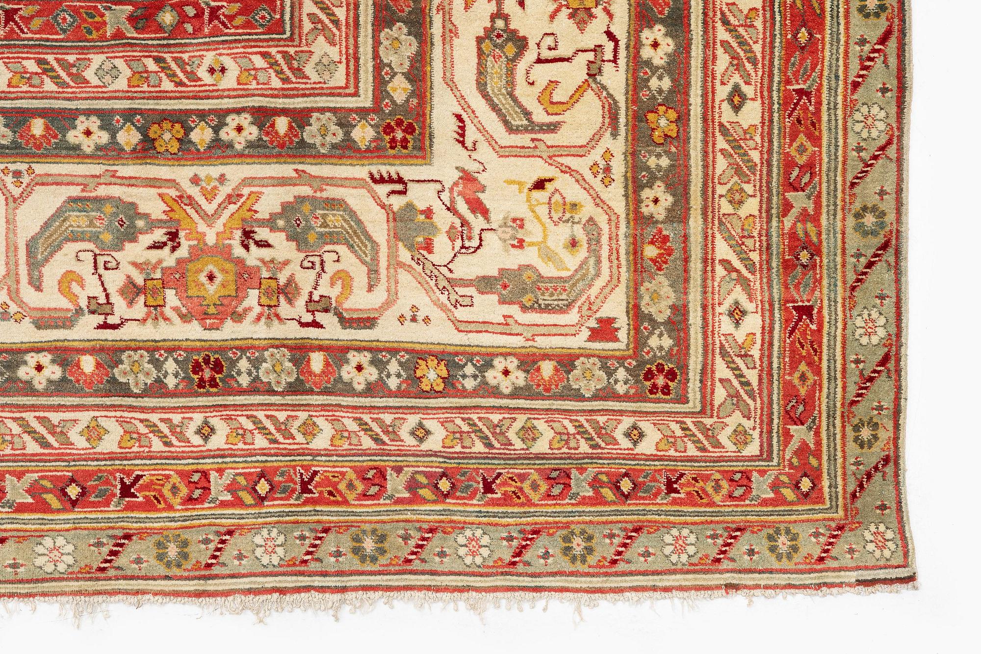 An antique Agra carpet, North India, c. 470 x 370 cm.