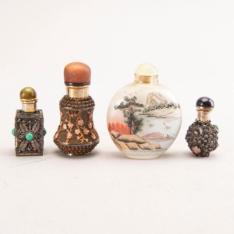 A set of seven different metal and glass snuff bottles 20th century.