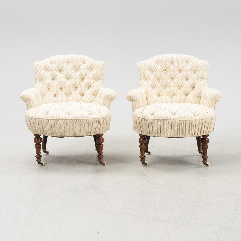 A pair of easy chairs, late 19th Century.