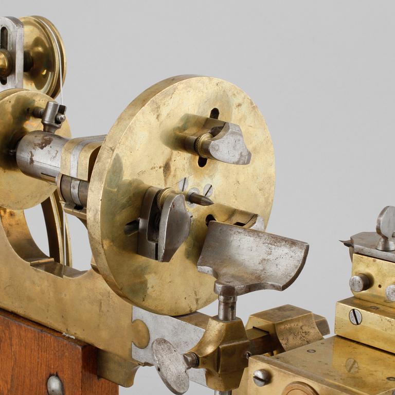 A hand powered lathe for watchmakers by R Flume in Berlin, 19th century.